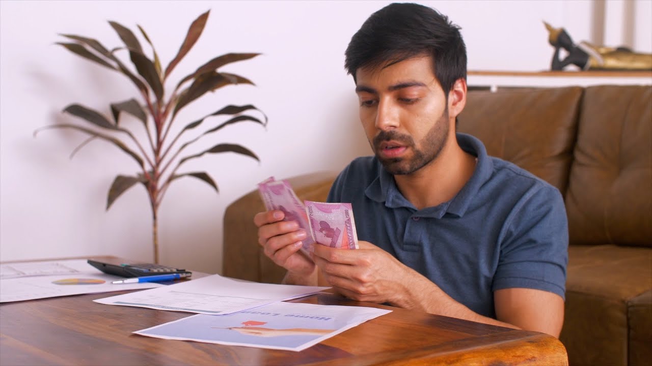 Worried Indian man counting money: Indian currency Rs 2000 not... | Indian Stock Footage | Knot9