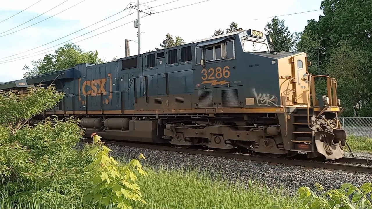 A Monster Sized CSX Freight Train West Thru Brighton