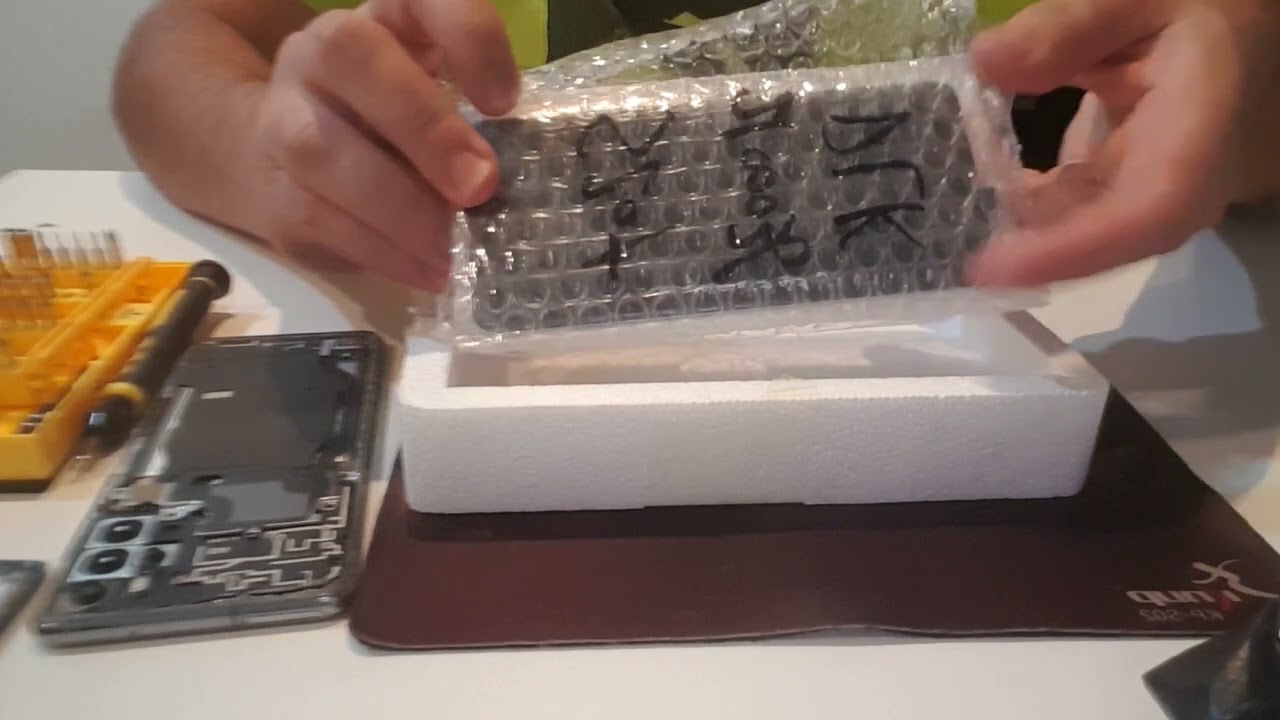 Abrindo compra AliExpress display celular s20+ plus com detalhe de pixels mortos e teste da tela