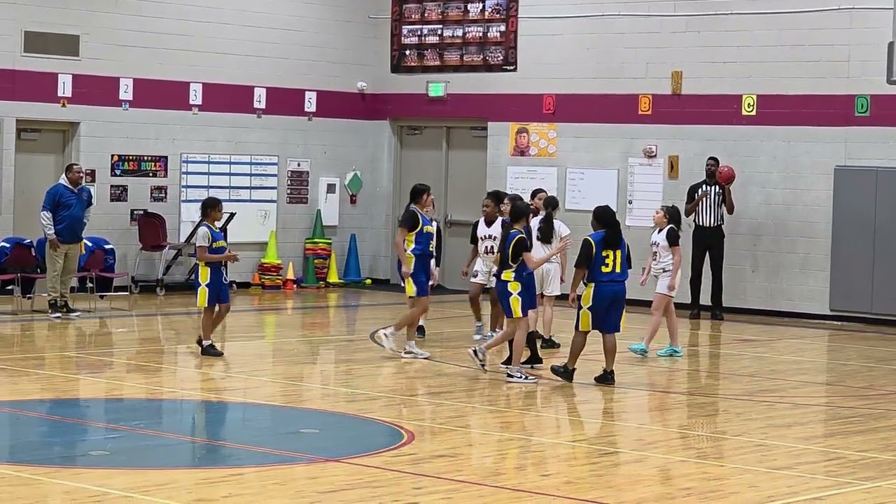 Harper's first game. They won and did so well. Proud of you my girl 