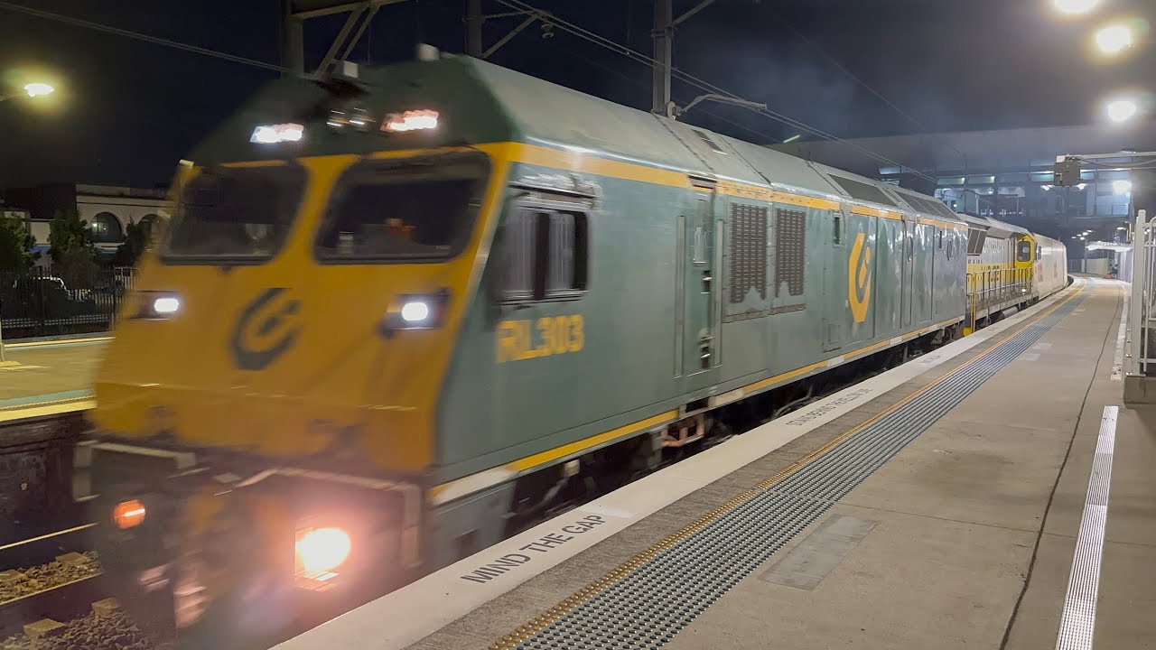 23/2/26 - QUBE 1515 passing West Ryde with RL303 and 1104