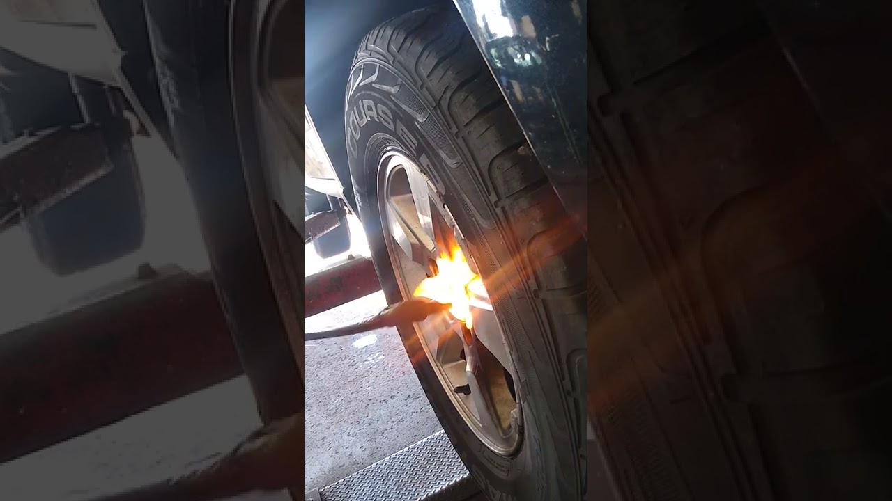 Using a acetylene torch to remove broken lug nut that's flush in the wheel contour