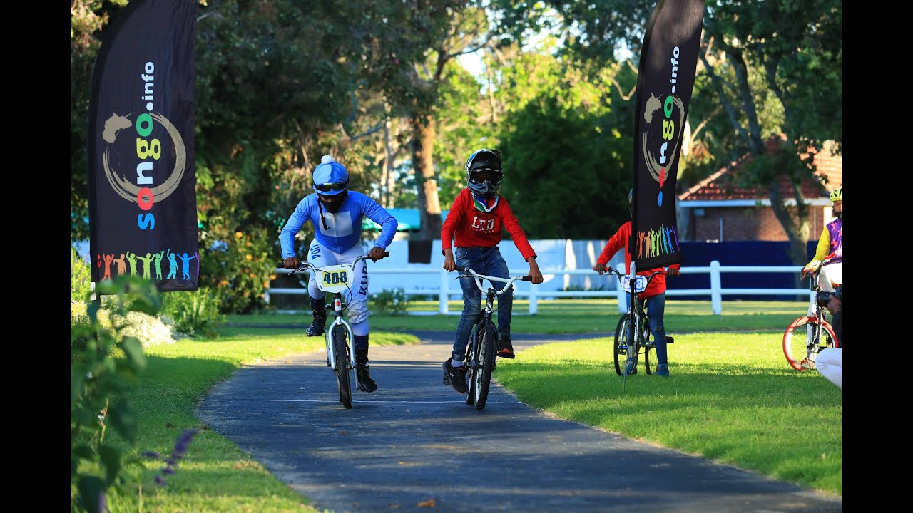 The Parade Ring Derby - BMX match races between jockeys and the Songo children.