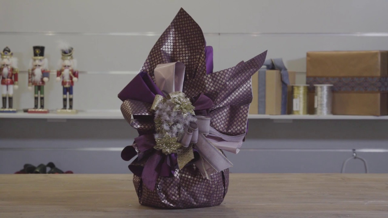 CONFEZIONARE UN PANETTONE CON FOGLI IN POLIPROPILENE