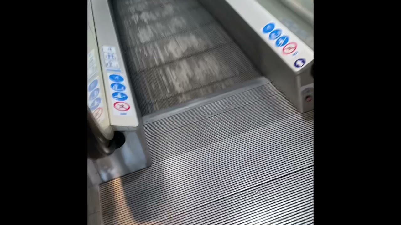 8 old otis travelators at an Italian Shopping Centre