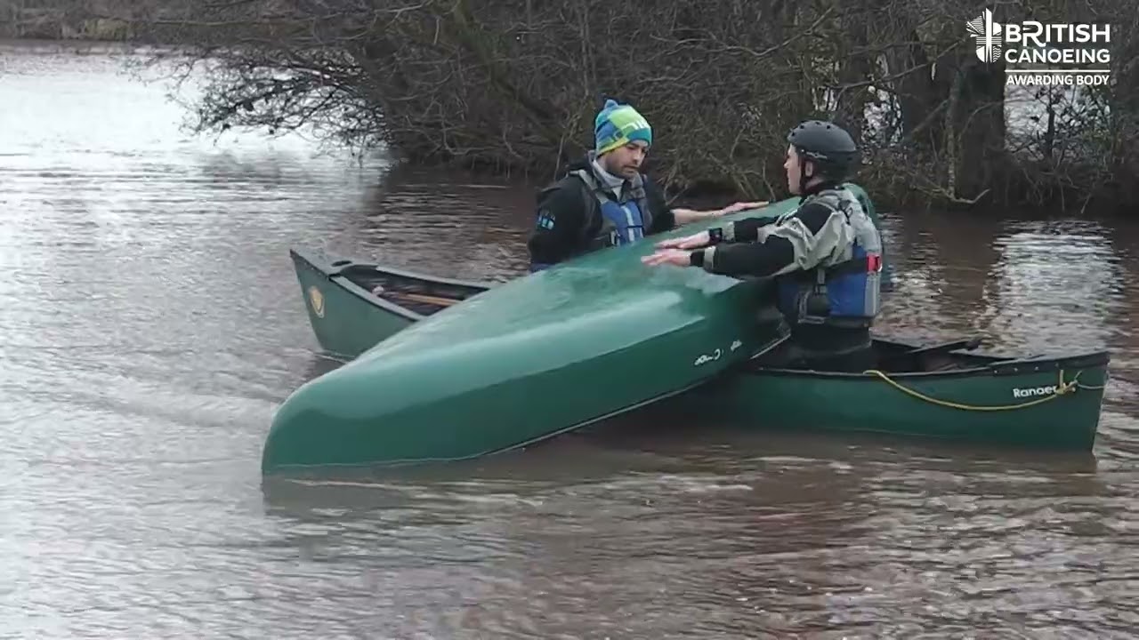 Open Canoe  Rescue - emptying a capsized canoe with help