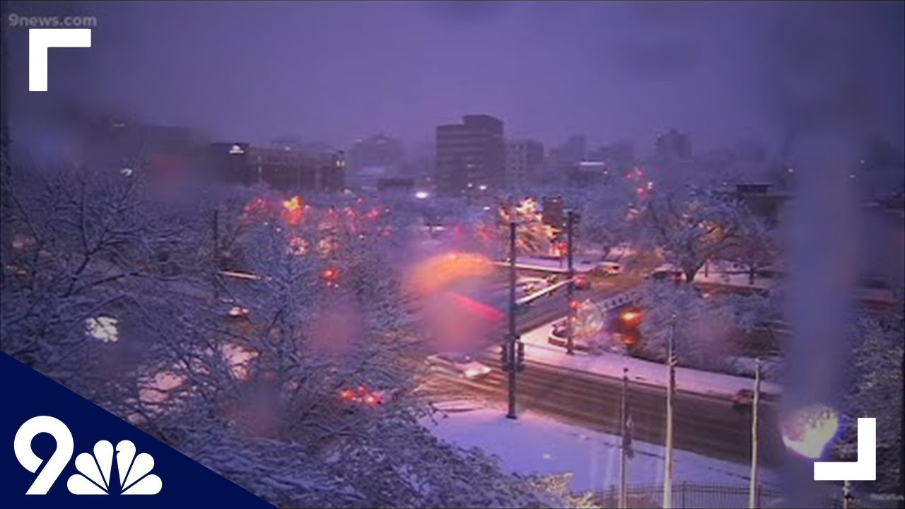 April snow falls in downtown Denver, Colo.
