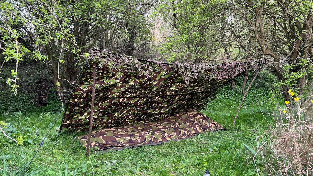 Early spring camp using military gear. Dutch army bivvi, British army Basha shelter.