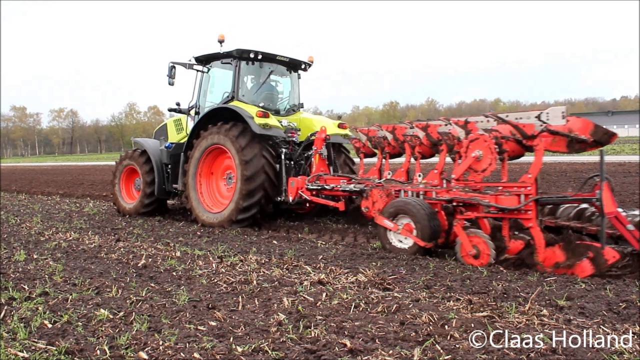 Claas Axion 800 aan het ploegen met een 5 ploegschaar Maschio Gaspardo - Claas Holland.