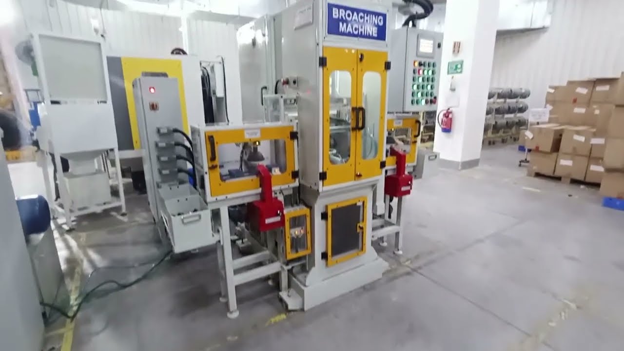 Automatic Broaching Machine with Vision System