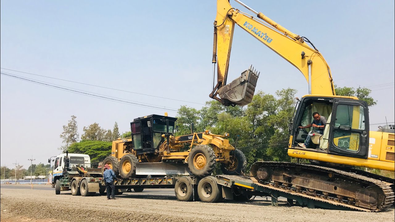 เกิดอะไรขึ้นกับรถเกรด CAT140G VS รถขุด Komatsu PC200