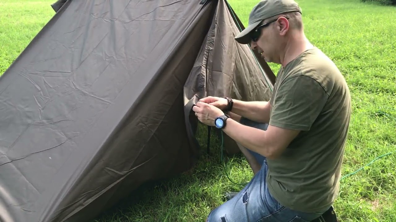Tarp basics , the canadian tent with two trekking poles.