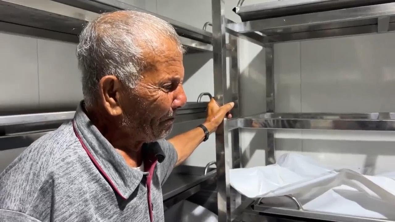 Relatives say goodbye to loved ones in morgue of Gaza hospital following Israeli airstrike in Rafah
