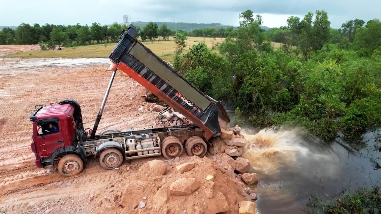 Wonderful Operation Dump Truck Dumping Soil Stones Filling in Lowland Area With Large Size Land