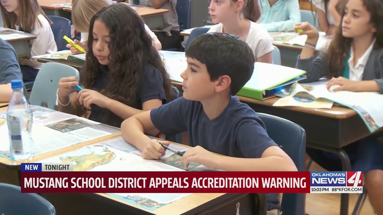 Mustang School District appeals accreditation warning