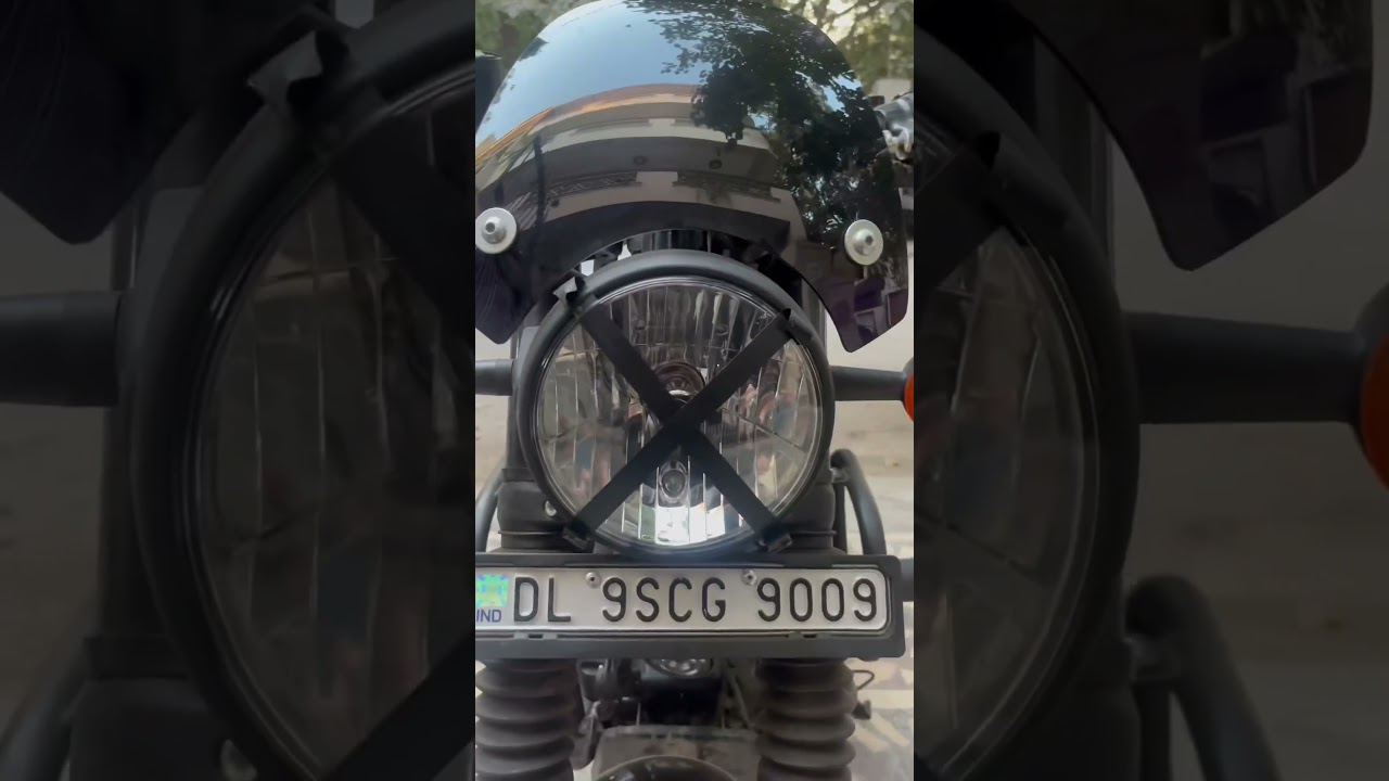 Installing x on headlight with electric tape 🚀🚀 #hunter350 #royalenfield