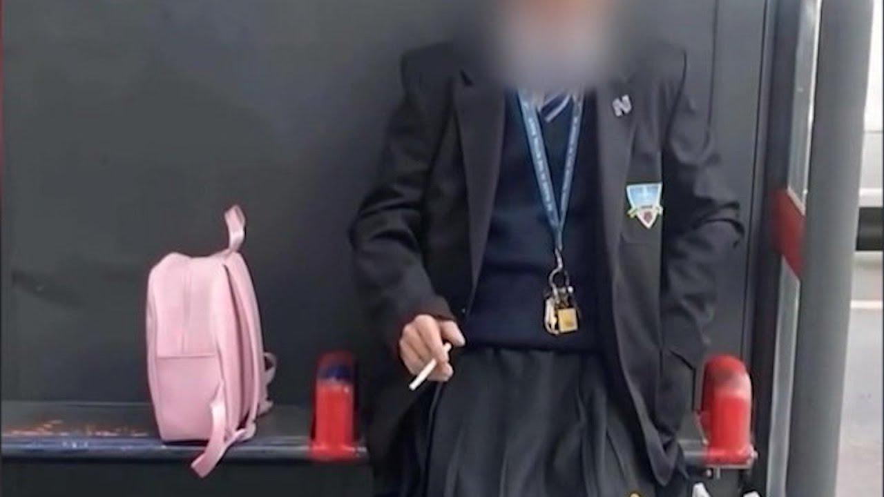 Parents alarmed by man dressed as schoolgirl with pink rucksack | SWNS