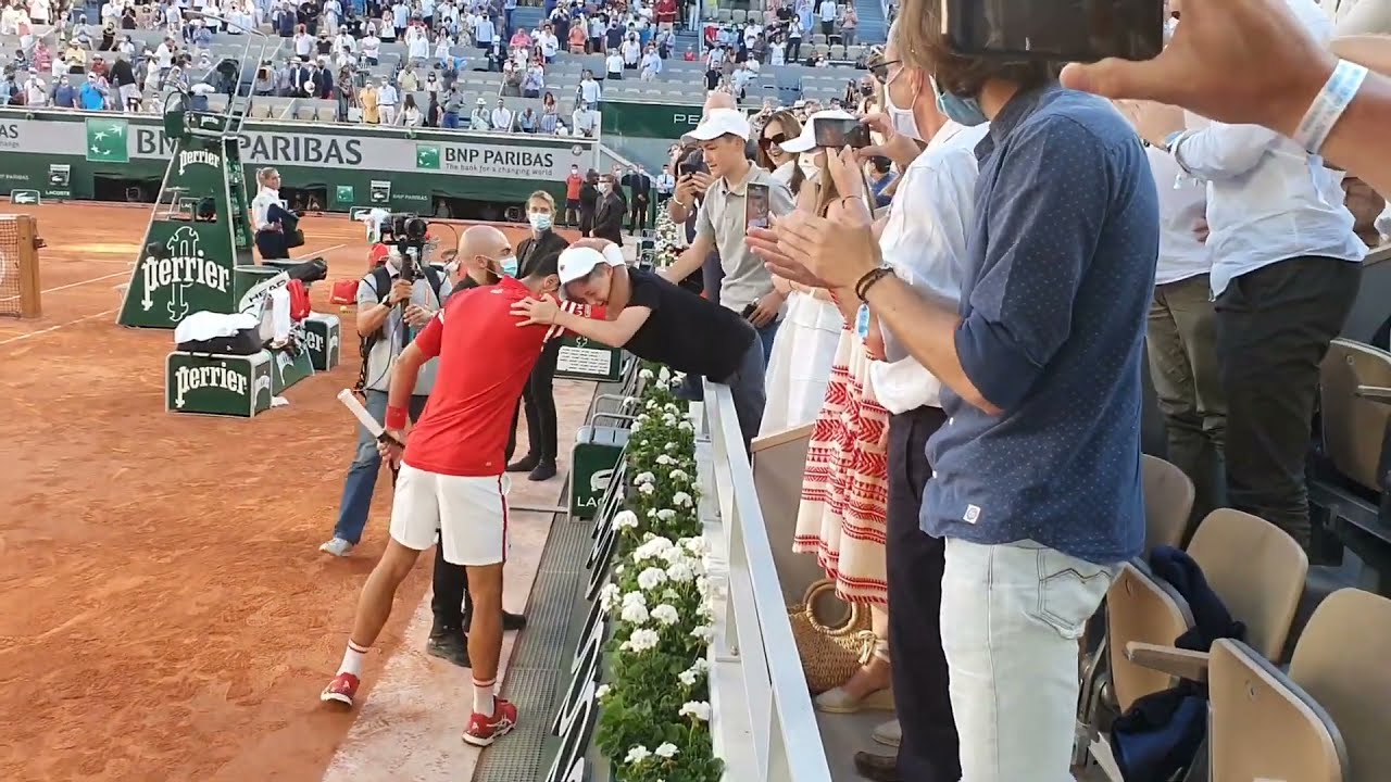 Novak Djokovic Gifts his racquet to his young fan & 'young coach' after French open final