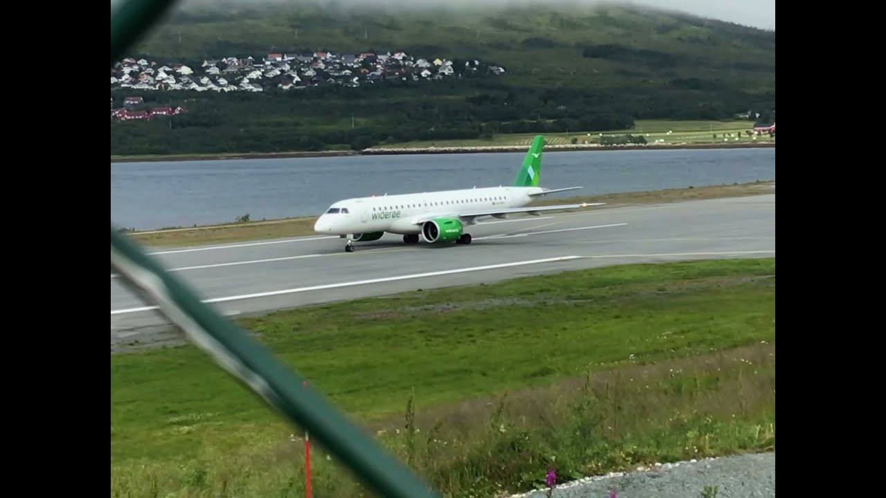 Wider&oslash;e Embraer E190 E2 ( LN-WEC ) landing and takeoff at Troms&oslash; Langnes airport