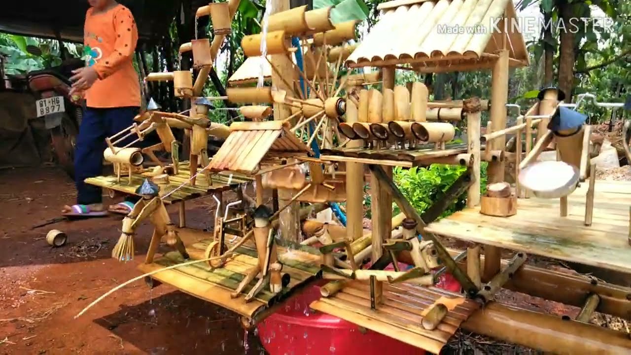 #2 bộ tiểu cảnh ống tre 9người lớn 2trẻ em gồm 11người.kết hợp thác nước đổ...đẹp hút hồn người xem.