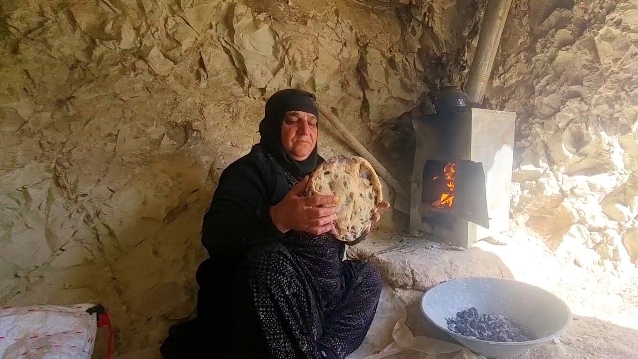 Grandma's traditional bread in the heart of a mountain cave 👵🥖