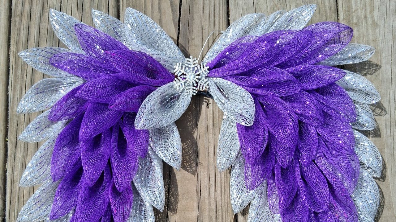 Easy 80 piece angel wing wreath. My Facebook link is in the description.