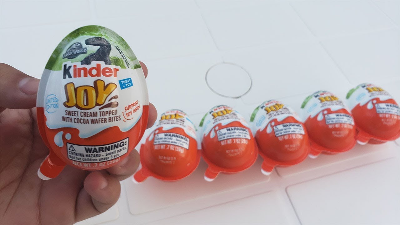 Kinder Joy Jurassic World. Dinossauros dentro! Brinquedos surpresas (surprise toys)