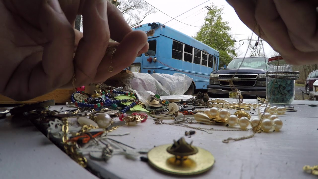 Sorting jewelry found at the hoarder house! Love digging for treasures!