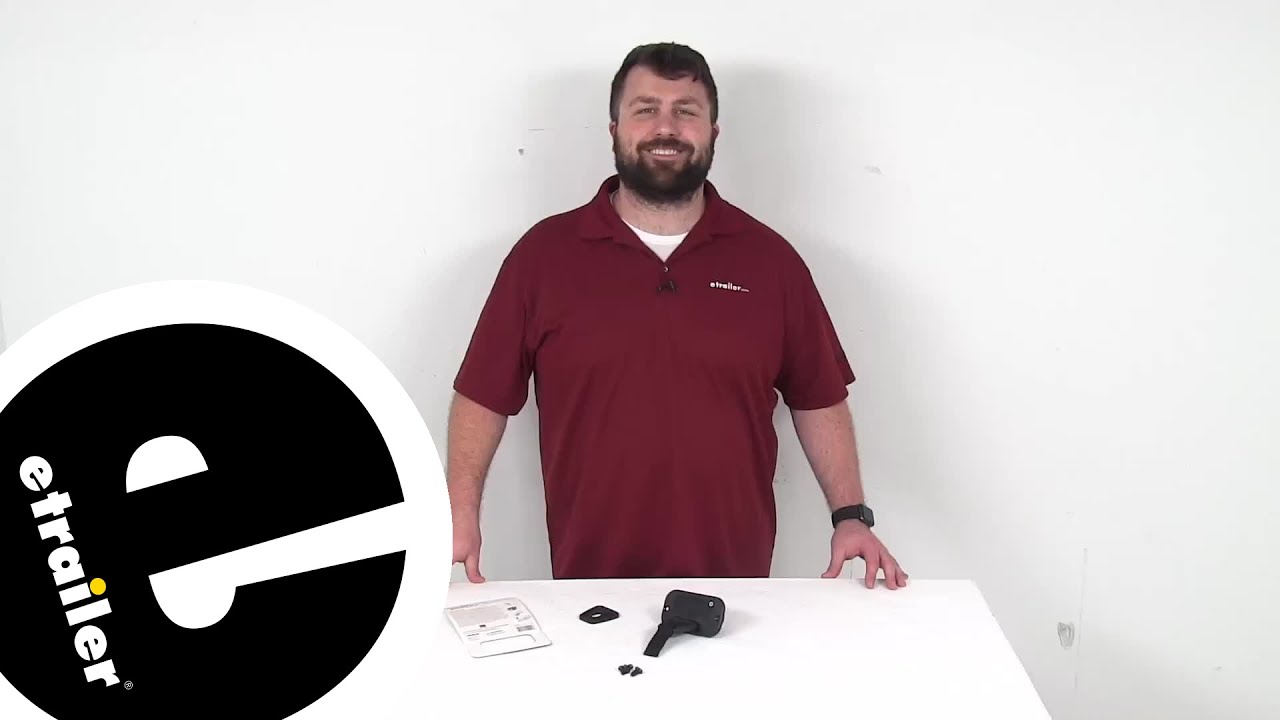 etrailer | Ultimate Overview of the RodBuckle Retractable Fishing Rod Tie-Down Strap