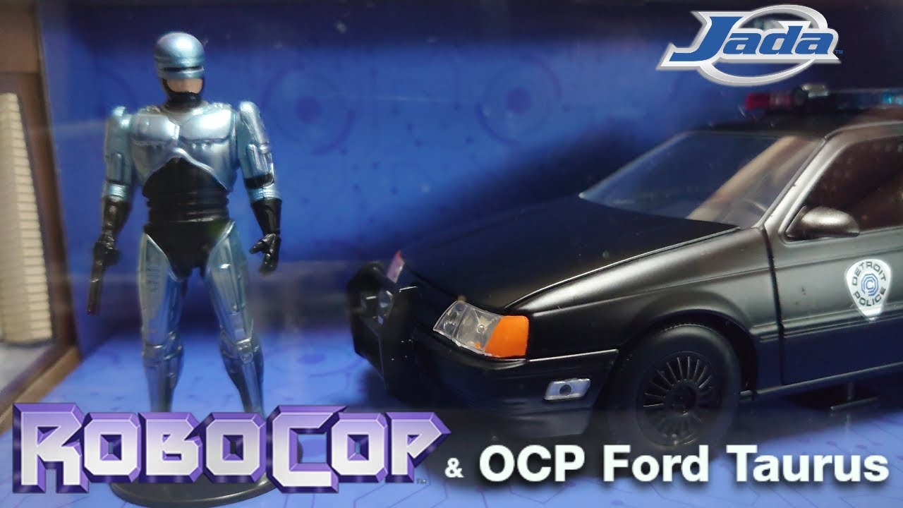 Jada  Robocop & OCP Ford Taurus  (Diecast Car & Figure  1:24 Scale)
