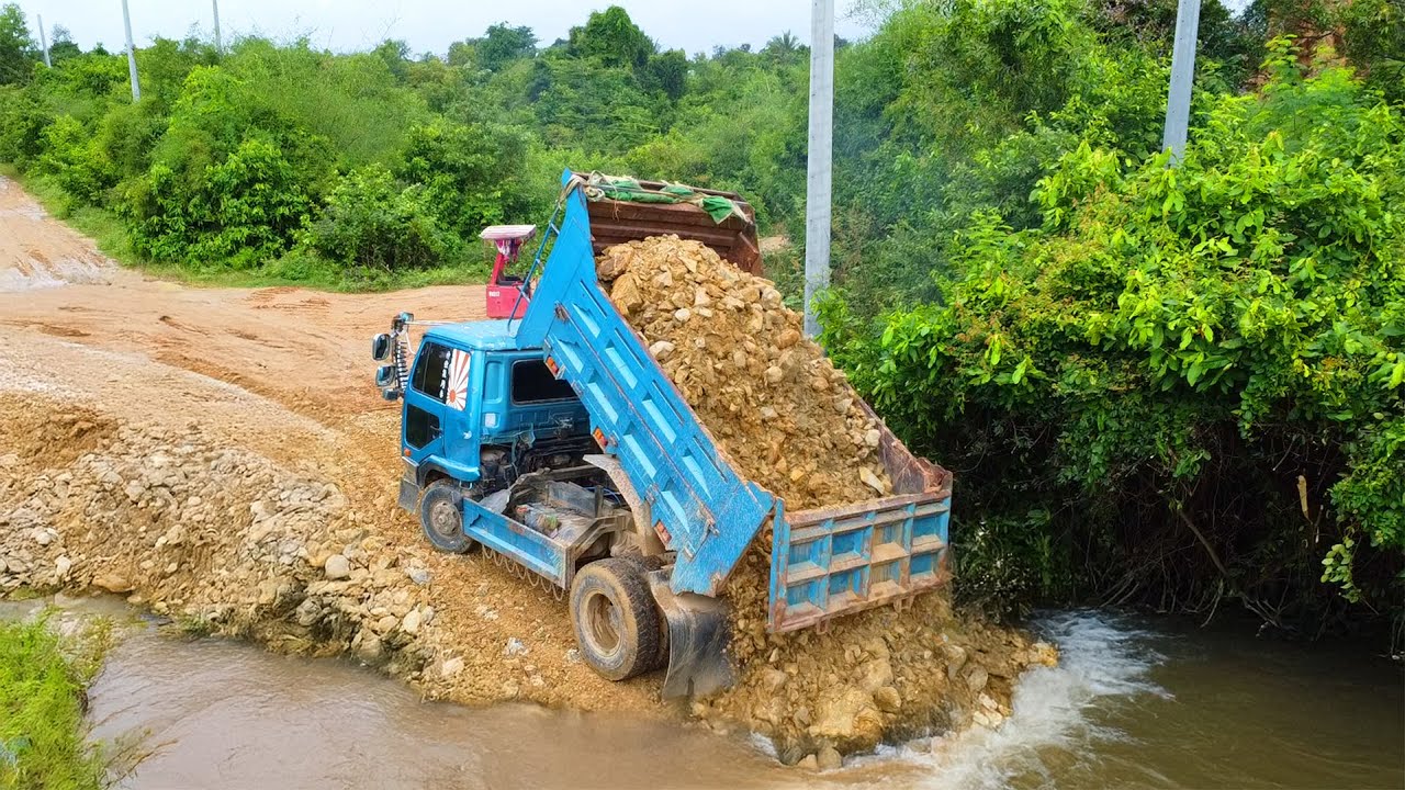 Start New Project Build Road on Canel By Komatsu D20P and Dump Trucks Uploading.