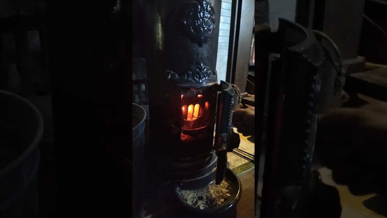 Petit Godin - tending the stove