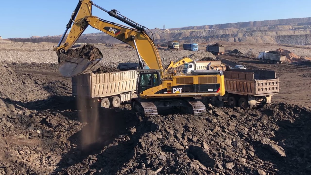 Caterpillar 385C Excavator Loading Mercedes & MAN Trucks - Sotiriadis/Labrianidis Mining Works
