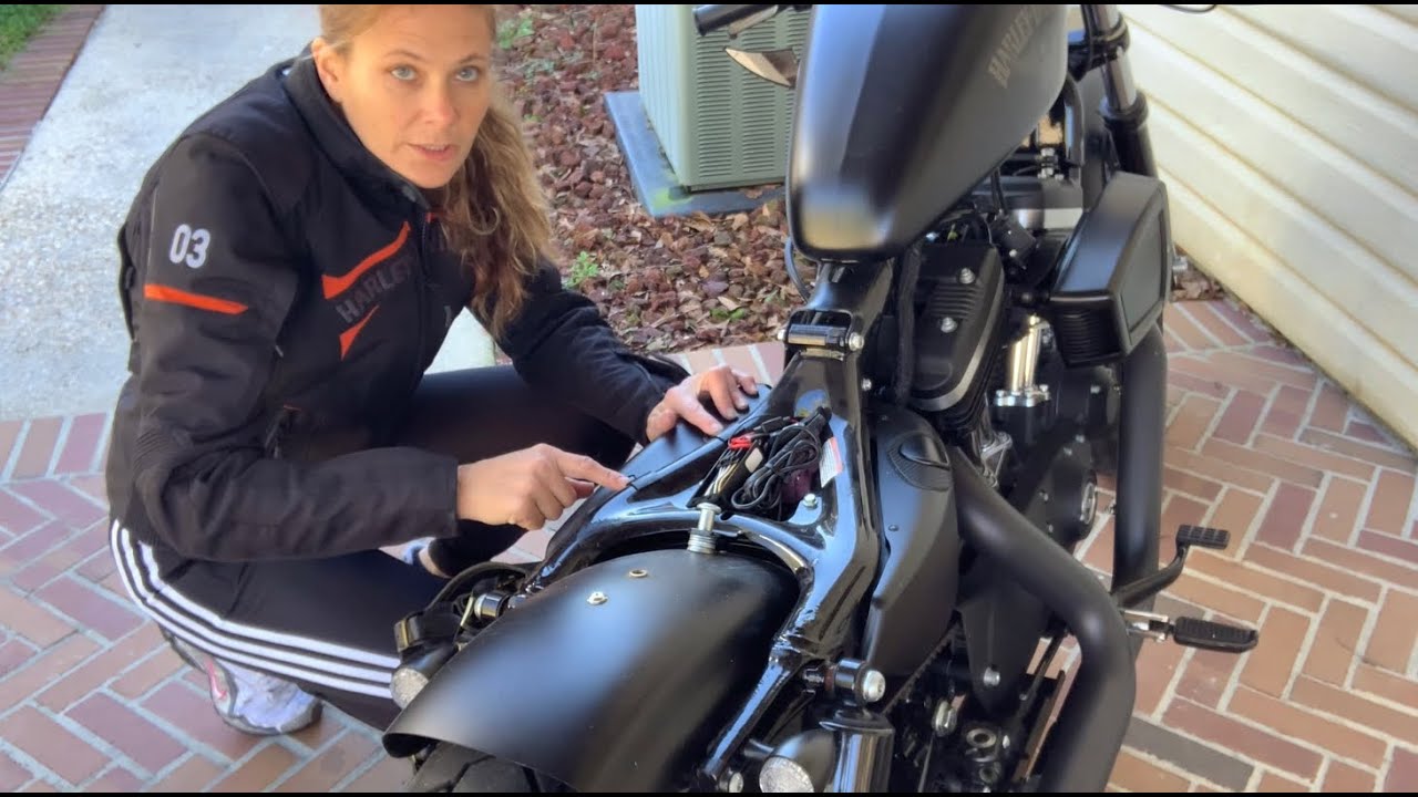 Jump starting a battery in an Iron 883 Harley-Davidson Sportster