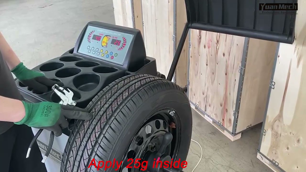 Wheel balancer machine with automatic measurement of distance and diameter
