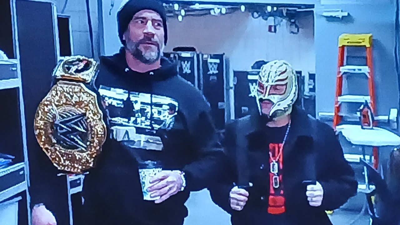 Rhea ripley helps iyo sky cm punk rey mysterio brawl the Vision nikki bella becky lynch message sent
