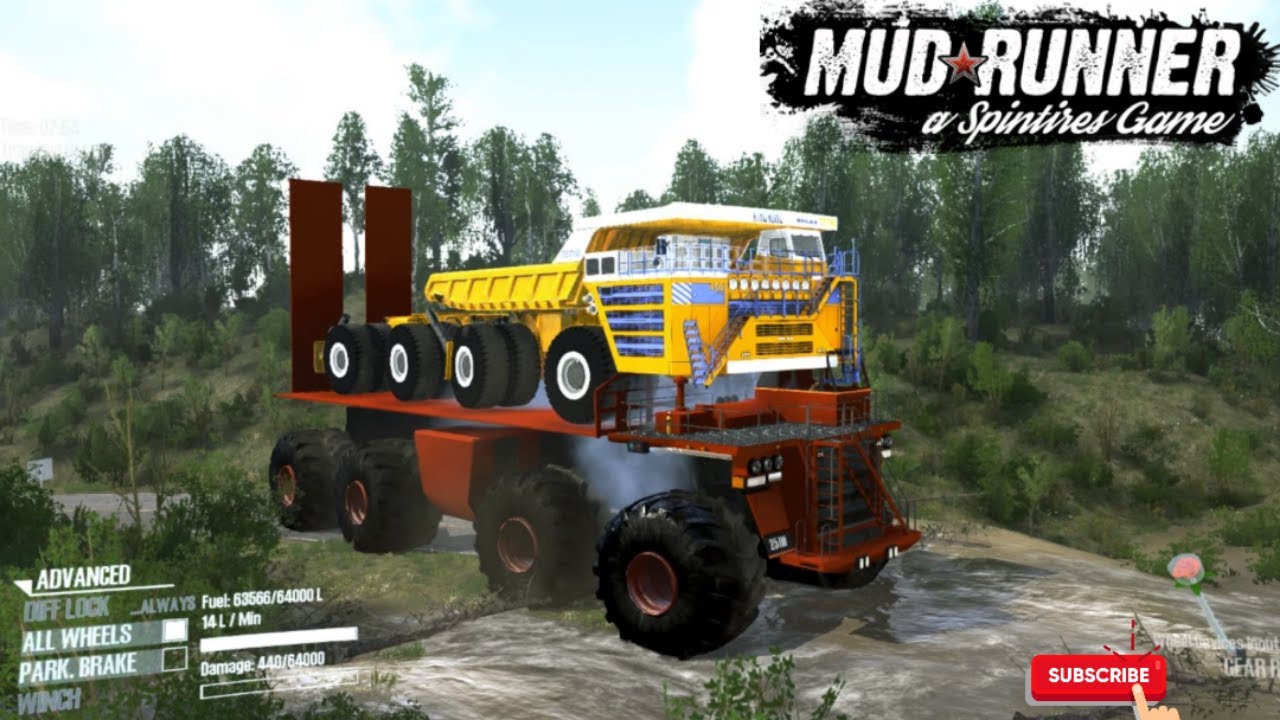 Giant truck hits the road with excavator and mining dumper on the back.