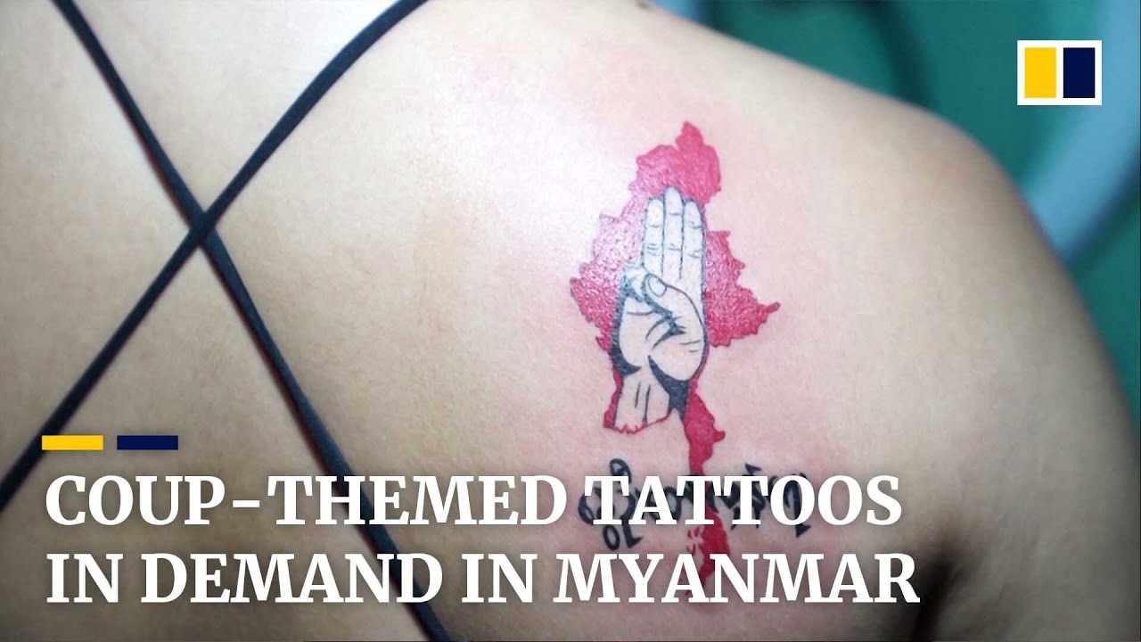 &lsquo;I don't want to forget that pain ever&rsquo;: Myanmar protesters ink bodies with coup-themed tattoos