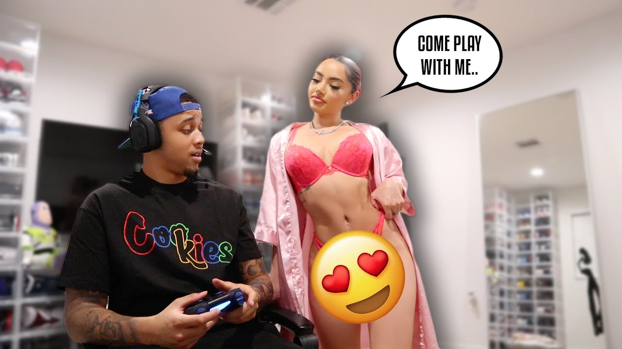 DISTRACTING MY BOYFRIEND WHILE HE PLAYS VIDEO GAMES!! **WEARING THIS..**