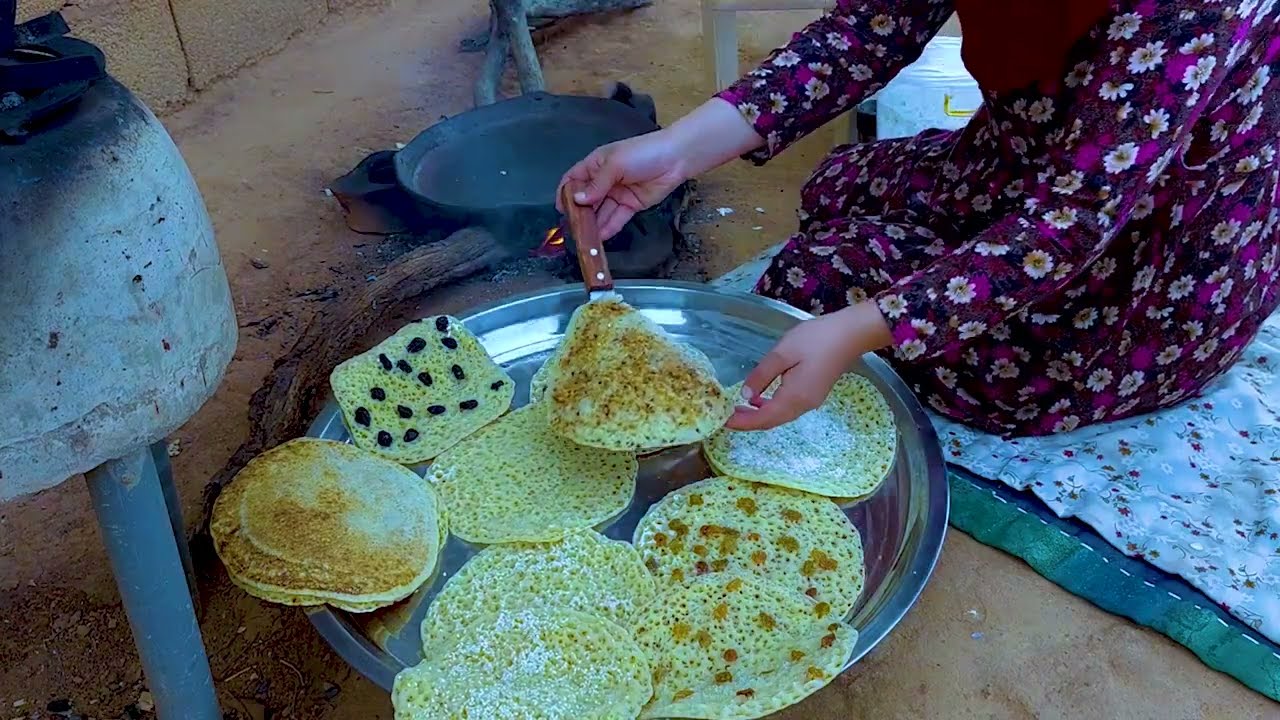 عادات غريبة لاهل الجبال في  غرس الفول وطهي البغرير  بالعنب  والبيض والفول السوداني والثوم وجوز الهند