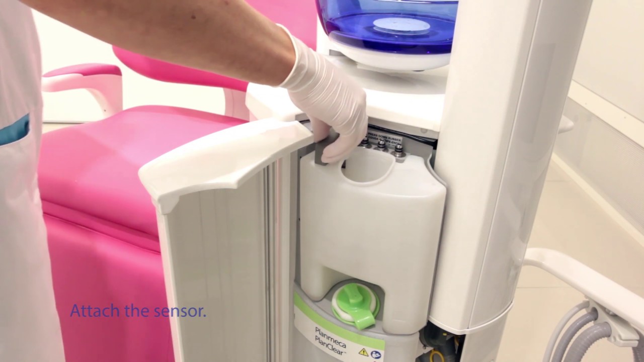 How to remove water container of Planmeca Sovereign® Classic