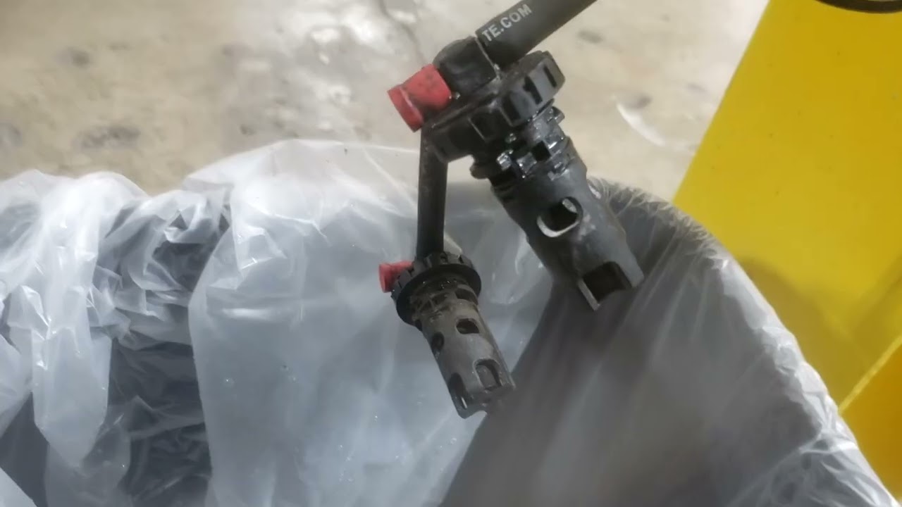 Industrial battery water injector testing 