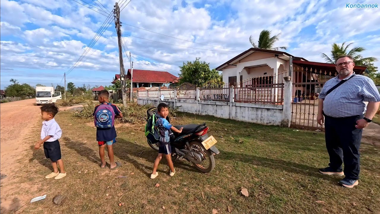 Visiting cousins house in the village of Pakse, Laos