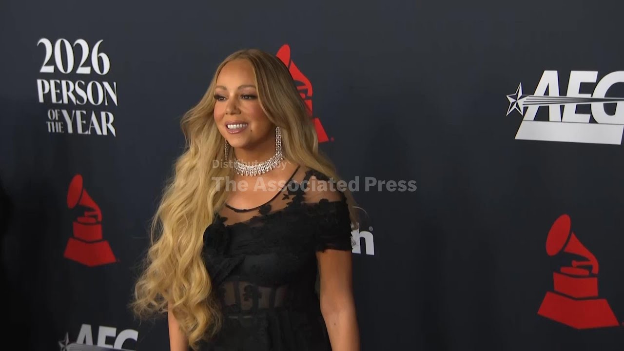 Mariah Carey and other celebrities pose at MusiCares 2026 Person of the Year event