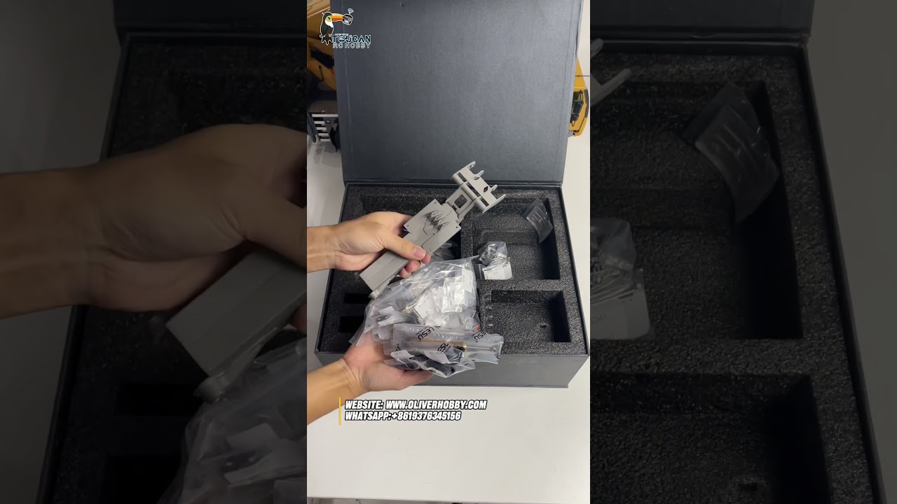 Unbox the LESU 1/14 AT1050 RC Hydraulic Fork Loader. 