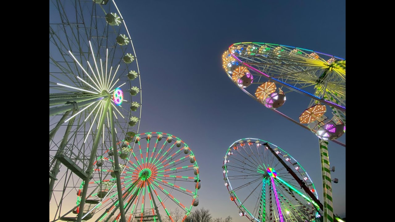 4 Illuminated Lamberink RL33 Ferris wheels on the company site in Overschild