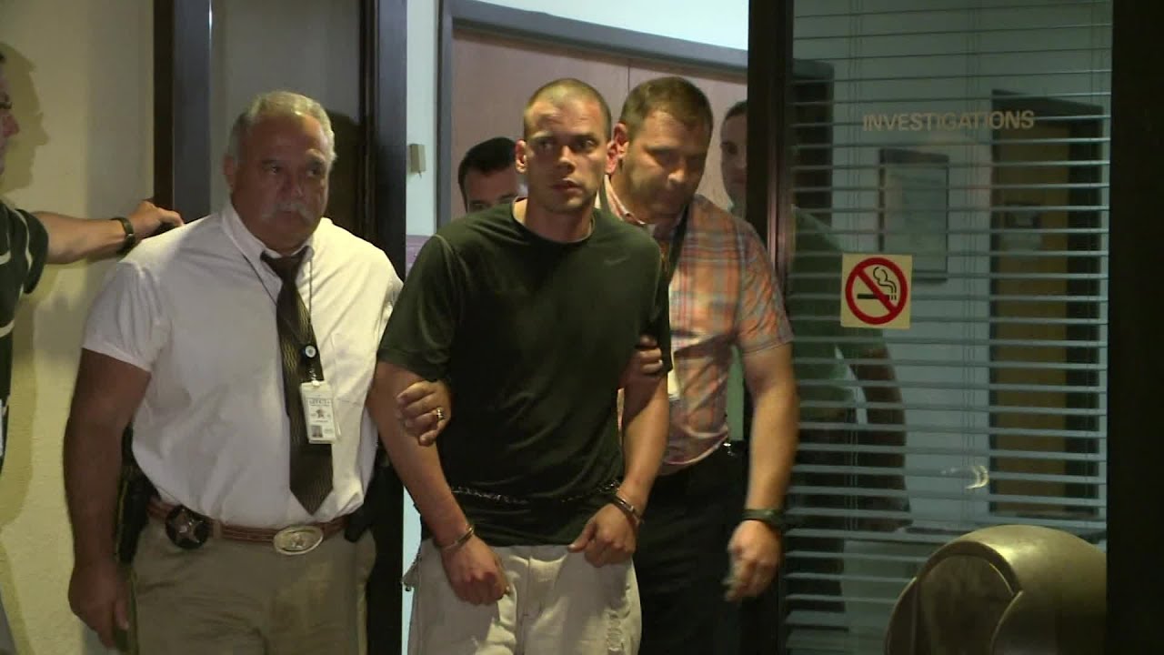 Arkansas realtor murder suspect perp walk