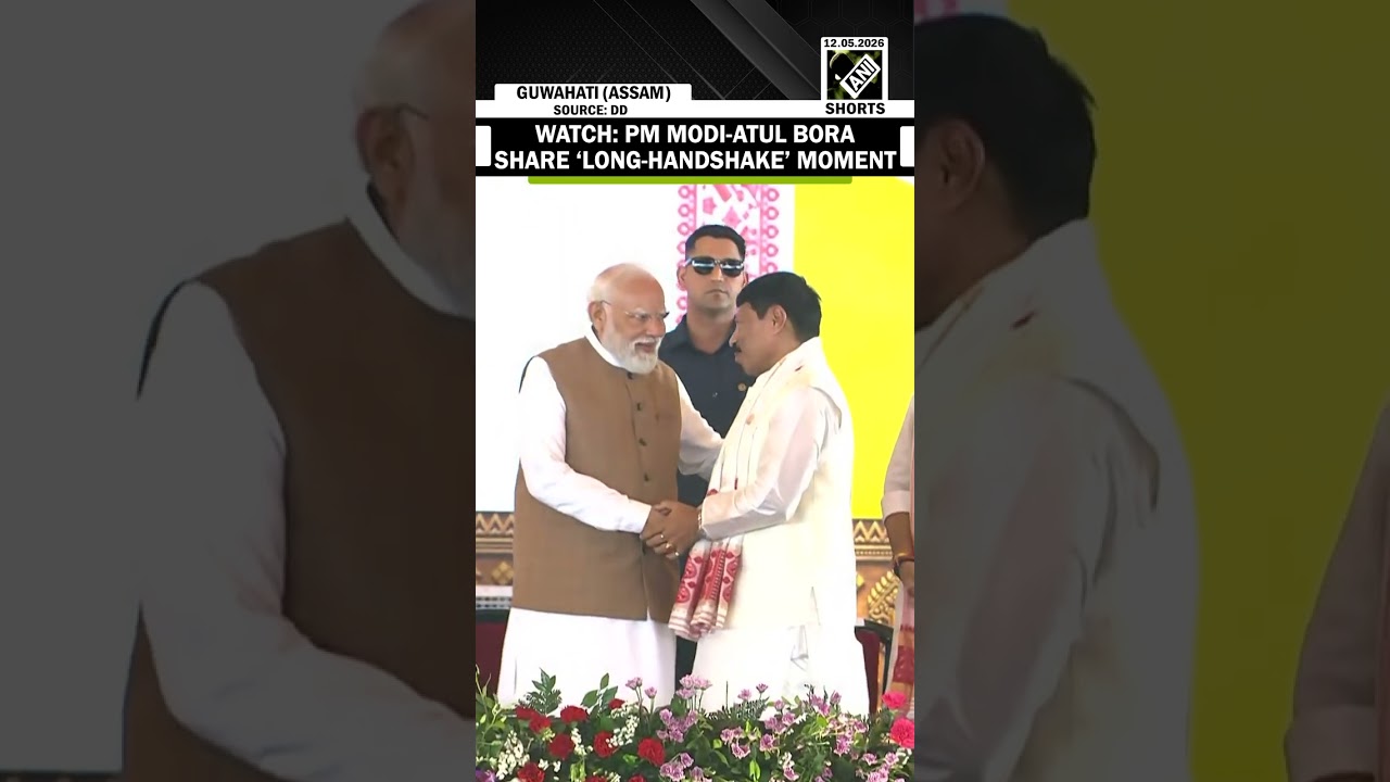 PM Modi and Assam Minister Atul Bora share a handshake moment at oath-taking ceremony