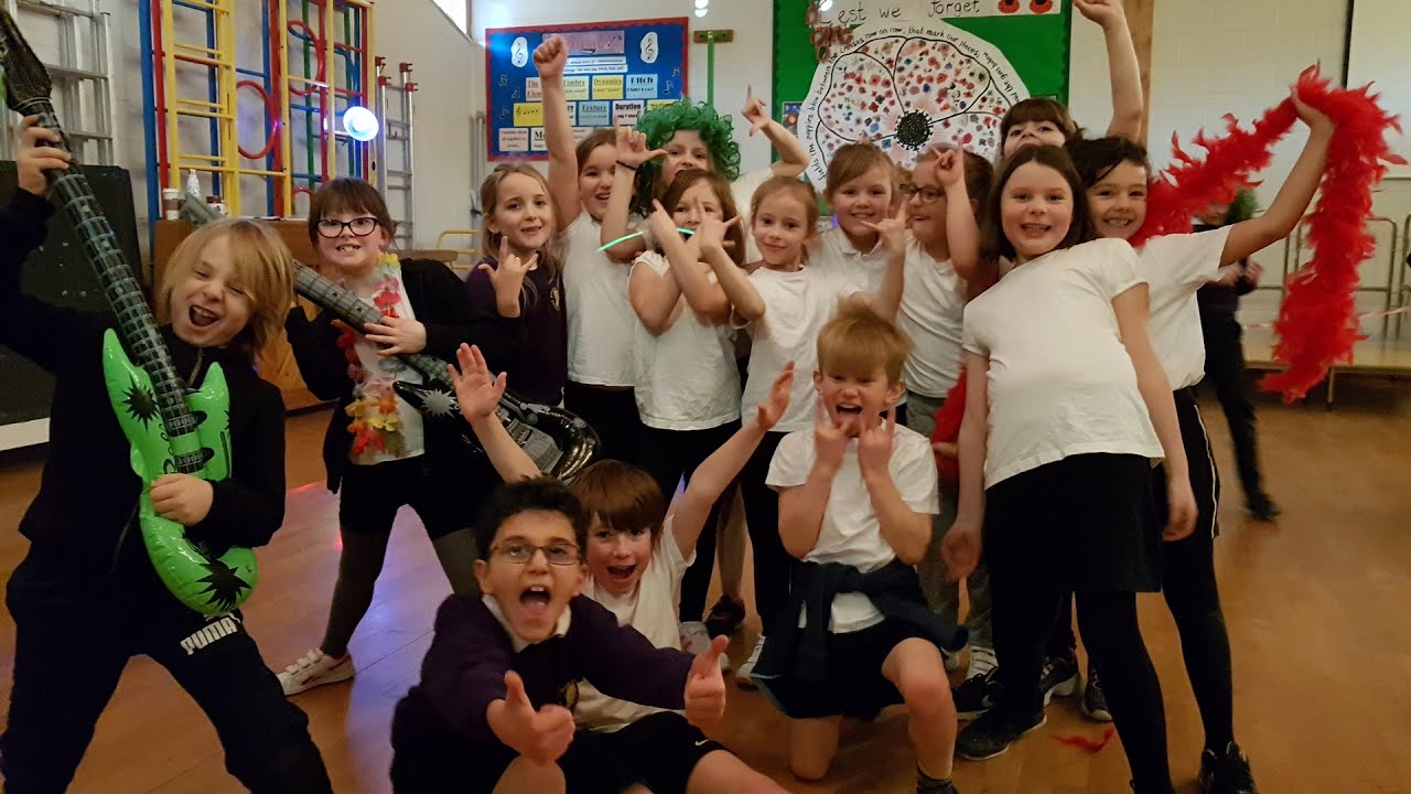 Watch school children in Woodbridge dancing to raise money for new school equipment