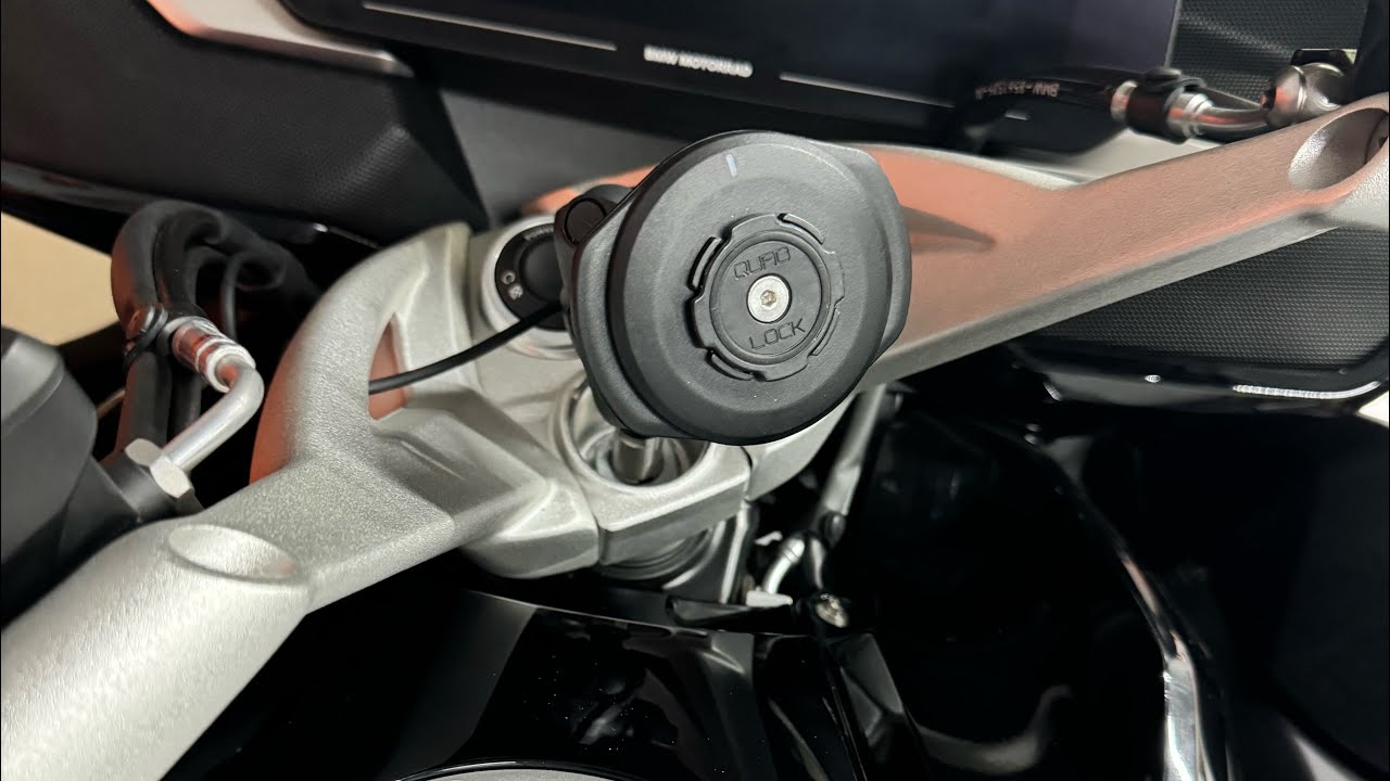 BMW K1600B phone mount and wireless charger set up using track form and quad lock pieces